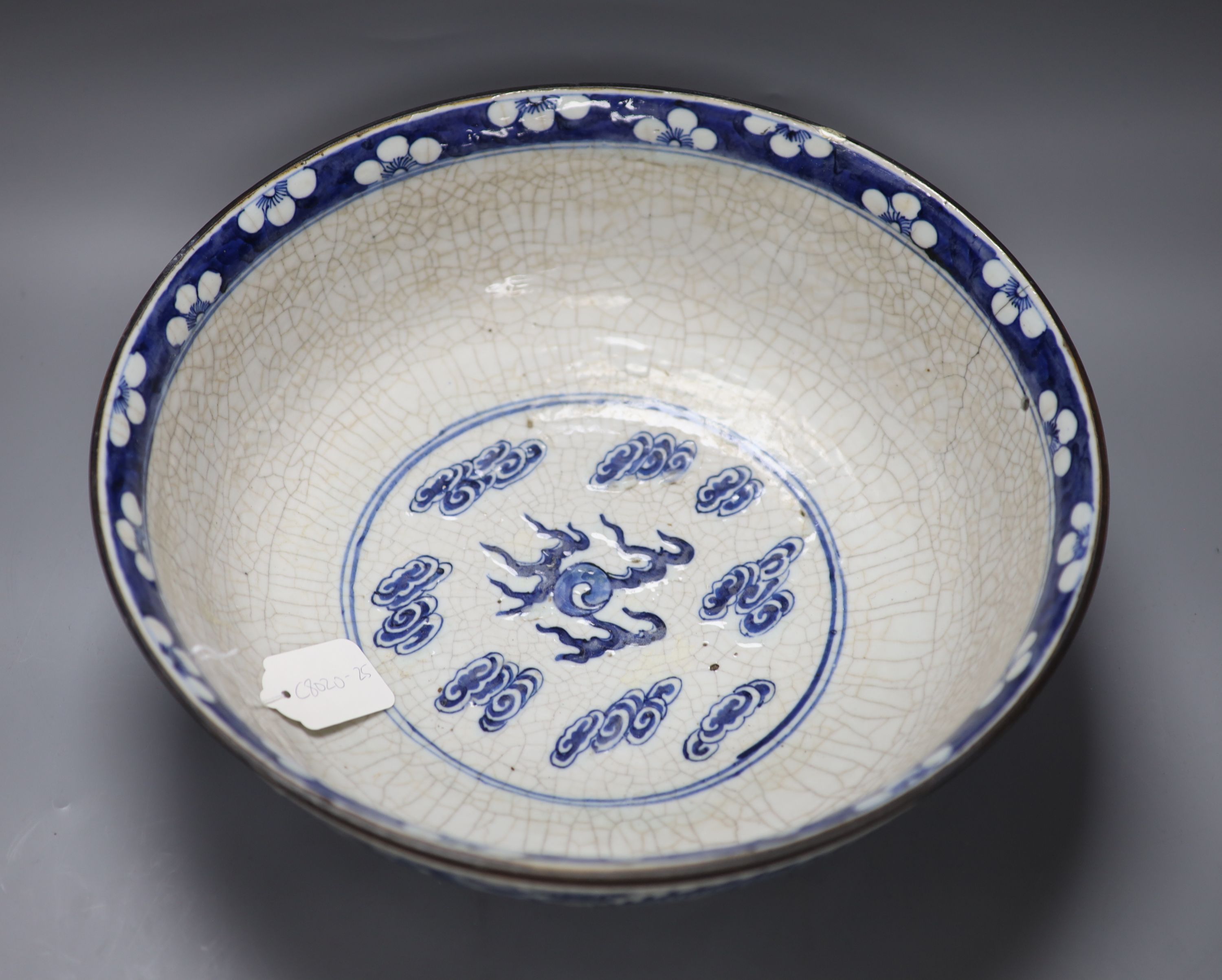 A large Chinese blue and white crackle glazed dragon bowl, 19th century, diameter 37cm